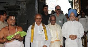 Image: Dr Singh goes barefoot at Tirupati temple