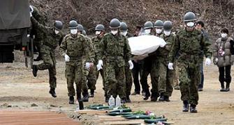 No fuel for cremation, Japan buries its dead