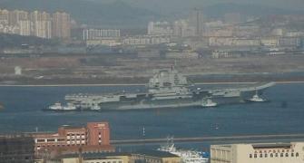 PHOTOS: China's aircraft carrier out for weapons check