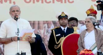 Modi sworn in Gujarat CM, ally JD-U, opp boycott ceremony