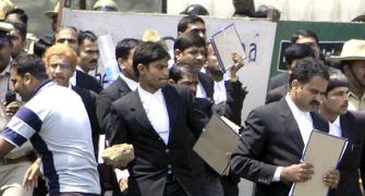 IMAGES: B'luru lawyers attack scribes, cops lathicharge