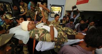 IN PIX: Naxal target CRPF bus; 12 jawans killed