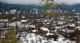 PHOTOS: Kashmir gets season's first major snowfall