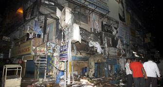 PICS: Twin blasts in Hyderabad's busy market kill 16