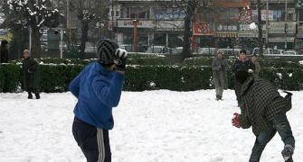 Pix: Heavy snow brings Kashmir to halt, power supply cut
