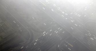PHOTOS: Beijing turns hazy under blanket of smog