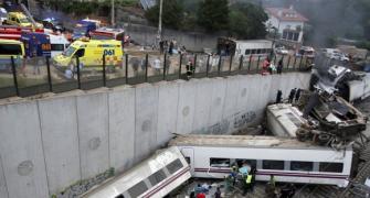Photos: 77 killed as train derails in Spain, snaps in two