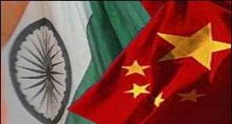 India-China hold talks to finalise Khurshid, Li's visits