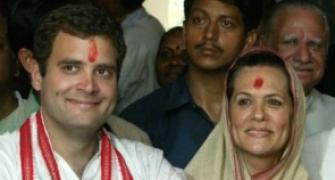 We ALL stand by Dr Singh, says Sonia, Rahul