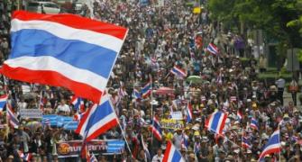 Thai protesters storm army headquarters, PM rules out polls