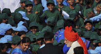 PM breaks protocol, exits car to meet school children at Red Fort