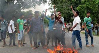 PHOTOS: People block NH-37 in Assam protesting police action