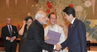 Discussing 'Modinomics' and 'Abenomics' in Japan