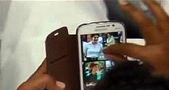Mobiles banned in K'taka assembly after MLA caught gazing at Priyanka's pic