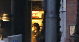 PHOTOS: Gunman holds hostages at Sydney cafe, Islamic flag put on window