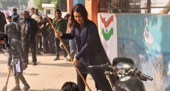 US Congresswoman Tulsi swept up in Modi's Clean India