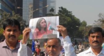 Devyani's father leads protest outside US consulate in Mumbai