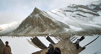 PHOTOS: A snowy trek begins for 7,000 Amarnath yatris