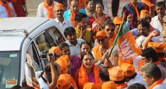 Modi resigns as Gujarat CM, Anandiben to take over