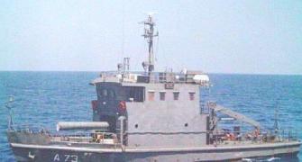 Over 20 hrs after vessel sinks, 4 navy personnel still missing