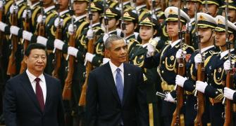 What strained ties? It's all smiles as Obama meets China' Xi