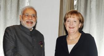 Will look into German language row: Modi assures Merkel