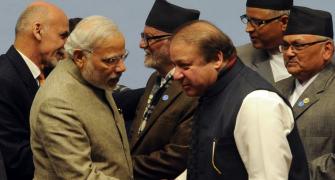 Committed to resolving issues with Pak through dialogue: Modi to Nawaz