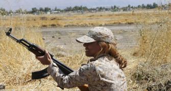 Mayssa Abdo, the gun-toting woman defending her town against ISIS