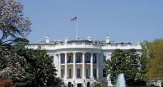 Man held for attempting to climb White House barrier