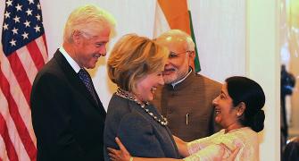 'New grandparents' Clintons keep their date with Modi