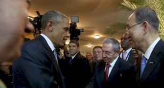 Obama, Castro share historic handshake amid thawing relations