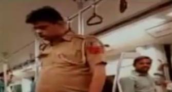 WATCH: Drunk cop takes a fall in Delhi metro