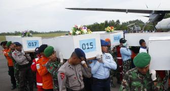 AirAsia crash: Rescuers find 30 bodies, focus on 5 sq km area