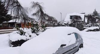 PHOTOS: Snow, rain, ice cover UK in wintry mess