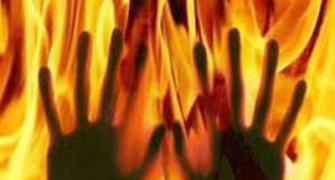 Woman set ablaze at police station dies, probe ordered