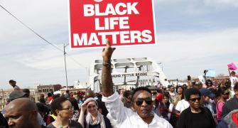 On Selma anniversary, thousands march to mark 'Bloody Sunday'