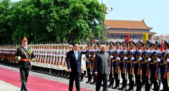 Modi welcomed with grand reception before talks with Chinese PM