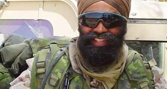 Soldier, cancer survivor, former terrorist: Facts about Canada PM's new cabinet