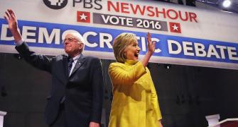 Race to White House: Clinton, Sanders spar over Obama, immigration