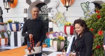 Halloween treat! Obama sings 'Purple Rain' to tot dressed as Prince