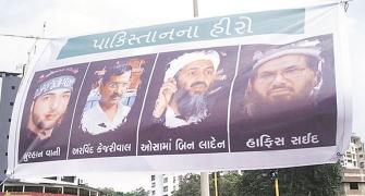 Bad company! Kejriwal shares space with Osama, Hafiz Saeed in posters in Surat