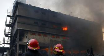 Fire continues to simmer at Bangladesh factory, toll up to 33