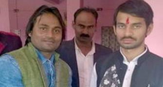 Embarrassment for Lalu after image of son with wanted sharpshooter goes viral