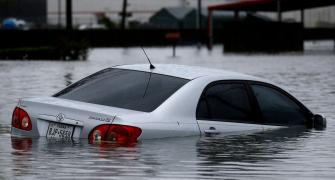 30 dead as Harvey makes 2nd landfall near Louisiana-Texas border
