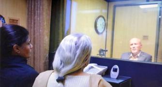 In Islamabad, Jadhav meets wife, mother -- from behind glass screen