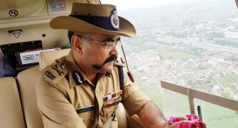 UP cop's flower shower on Kanwariyas sparks row