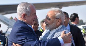 With hugs and handshakes, Netanyahu begins India visit