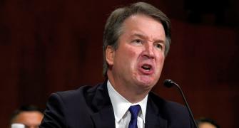 Trump stands by beleaguered judge Kavanaugh after fiery Senate hearings