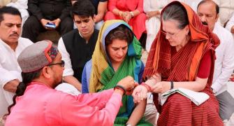 With puja and roadshow, Sonia, Smriti file nominations