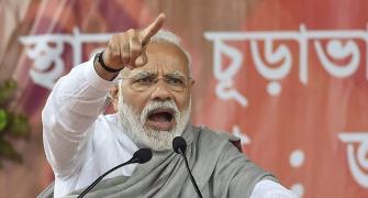 Modi says Mamata shielding corrupt; Didi calls him 'Mr Maddy'